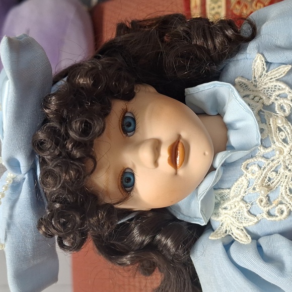 Elegant Blue Porcelain Doll with Lace Dress - Picture 2 of 5